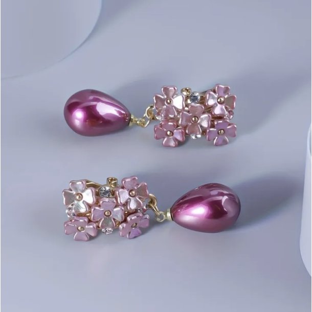 Clips �reringe med de flotteste lilla blomster