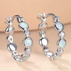 s925 s�lv �reringe med �gta Opaler, og Zirkoner