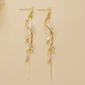 Flotte lange Guldbelagte �reringe