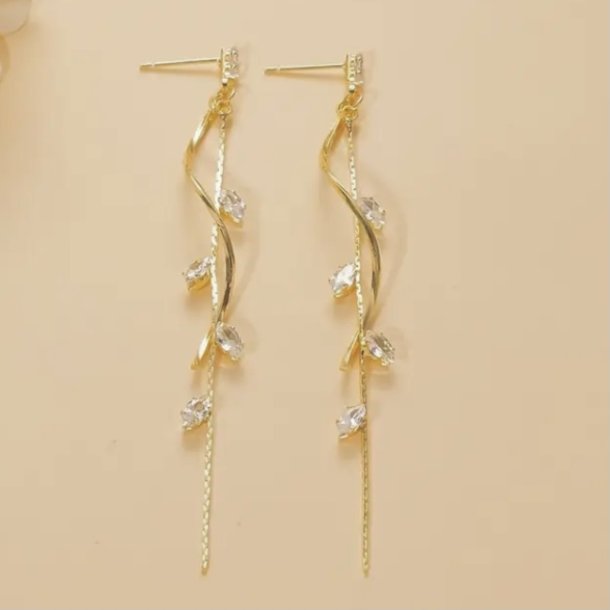 Flotte lange Guldbelagte �reringe